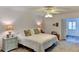Main bedroom with king-size bed and ensuite bathroom at 3404 Falcon Pl, Bradenton, FL 34210