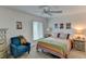 Bright bedroom with a comfy bed and charming decor at 3404 Falcon Pl, Bradenton, FL 34210