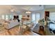 Bright dining area with glass table and hardwood floors at 3404 Falcon Pl, Bradenton, FL 34210