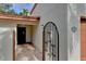 Brick walkway leads to the entrance with an iron gate at 3404 Falcon Pl, Bradenton, FL 34210