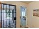 Bright entryway with view into a bedroom and patio at 3404 Falcon Pl, Bradenton, FL 34210