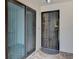 Private entrance with a security door and sliding glass door at 3404 Falcon Pl, Bradenton, FL 34210