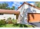 Inviting exterior with a charming gate and lush landscaping at 3404 Falcon Pl, Bradenton, FL 34210