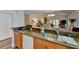 Modern kitchen features granite countertops and a convenient breakfast bar at 3404 Falcon Pl, Bradenton, FL 34210
