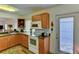 Well-equipped kitchen featuring wood cabinets and modern appliances at 3404 Falcon Pl, Bradenton, FL 34210