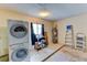 Laundry room with washer, dryer, and ample storage space at 3404 Falcon Pl, Bradenton, FL 34210