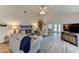 Spacious living area with comfy sofas and a large TV at 3404 Falcon Pl, Bradenton, FL 34210