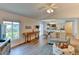 Open living room featuring a cozy sofa and hardwood floors at 3404 Falcon Pl, Bradenton, FL 34210