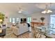 Open living and dining area with vaulted ceilings at 3404 Falcon Pl, Bradenton, FL 34210