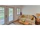 Relaxing sitting area with French doors leading to the backyard at 3404 Falcon Pl, Bradenton, FL 34210
