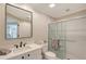Clean bathroom with walk-in shower and modern vanity at 3408 Fair Oaks Ln, Longboat Key, FL 34228