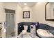 Clean bathroom boasts a shower, toilet and vanity at 3408 Fair Oaks Ln, Longboat Key, FL 34228