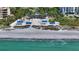 Beach access with picnic pavilions, offering stunning ocean views at 3408 Fair Oaks Ln, Longboat Key, FL 34228