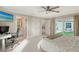 Spacious bedroom with private patio access and en-suite bathroom at 3408 Fair Oaks Ln, Longboat Key, FL 34228
