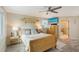 Charming bedroom with en-suite bathroom and water views at 3408 Fair Oaks Ln, Longboat Key, FL 34228