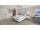Guest bedroom with a desk and access to a hallway at 3408 Fair Oaks Ln, Longboat Key, FL 34228