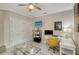 Bright home office features built-in shelving and a workspace with a view at 3408 Fair Oaks Ln, Longboat Key, FL 34228