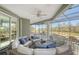 Relaxing outdoor patio overlooking a golf course at 3408 Fair Oaks Ln, Longboat Key, FL 34228
