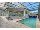 Private pool and spa with brick pavers and lounge chairs at 3408 Fair Oaks Ln, Longboat Key, FL 34228