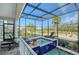 Relaxing spa with screened enclosure and golf course view at 3408 Fair Oaks Ln, Longboat Key, FL 34228