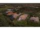 Aerial view of single-Gathering homes in a community with tile roofs, screened-in pools, and mature landscaping at 3769 Caledonia Ln, Sarasota, FL 34240