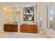 Bright bathroom with a soaking tub, dual vanities, and separate shower stalls for a spa-like experience at 3769 Caledonia Ln, Sarasota, FL 34240