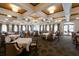 Large dining room with high ceilings and elegant tables at 3769 Caledonia Ln, Sarasota, FL 34240
