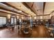 Elegant dining room with hardwood floors, exposed beams, and comfortable seating at 3769 Caledonia Ln, Sarasota, FL 34240