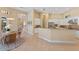 Open concept kitchen with breakfast nook and views to the backyard at 3769 Caledonia Ln, Sarasota, FL 34240