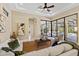 Open concept living room with lots of natural light and access to an outdoor patio at 3769 Caledonia Ln, Sarasota, FL 34240