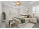 Spacious bedroom with a king-size bed and neutral decor at 4801 Brickell Dr, North Port, FL 34286