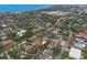 An aerial view shows the home's location in a quiet neighborhood close to shopping and the beach at 4946 Brywill Cir, Sarasota, FL 34234