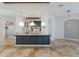 Spacious kitchen with granite countertops, stainless steel appliances, and modern lighting features at 4946 Brywill Cir, Sarasota, FL 34234