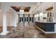 Spacious living room features tile flooring, a large island, and lots of natural light at 4946 Brywill Cir, Sarasota, FL 34234