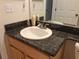 Bathroom with granite countertop and a sink at 5115 44Th St W, Bradenton, FL 34210