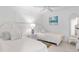 Charming bedroom with twin beds, perfect for guests at 512 W Venice Ave # 401, Venice, FL 34285
