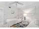 Well-lit bedroom with twin beds and beachy decor at 512 W Venice Ave # 401, Venice, FL 34285