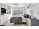 Comfortable main bedroom with ample built-in storage at 512 W Venice Ave # 401, Venice, FL 34285