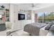 Bright bedroom with built-in storage and private balcony at 512 W Venice Ave # 401, Venice, FL 34285