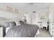 Main bedroom with built-ins and calming decor at 512 W Venice Ave # 401, Venice, FL 34285