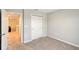 Bedroom with access to loft and double door closet at 5509 Coachwood Cv, Bradenton, FL 34211