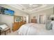 Main bedroom with large TV and dresser at 5846 Cavano Dr, Sarasota, FL 34231