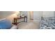 Serene bedroom with daybed, reading chair, and built-in shelving at 5846 Cavano Dr, Sarasota, FL 34231