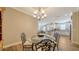 Open dining room, view of kitchen and breakfast bar at 5846 Cavano Dr, Sarasota, FL 34231