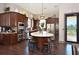Community clubhouse kitchen with island and bar seating at 5846 Cavano Dr, Sarasota, FL 34231