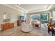 Spacious living room with hardwood floors and lots of natural light at 5846 Cavano Dr, Sarasota, FL 34231