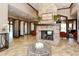 Community clubhouse lobby with fireplace and seating area at 5846 Cavano Dr, Sarasota, FL 34231