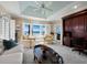Sitting room features ocean views, built-in cabinetry, and comfortable seating at 6161 Gulf Of Mexico Dr, Longboat Key, FL 34228