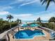 Luxury pool and beach access with multiple umbrellas at 6161 Gulf Of Mexico Dr, Longboat Key, FL 34228