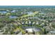 An aerial shot of the community, showing the surrounding golf course and lakes at 6523 Virginia Xing, University Park, FL 34201